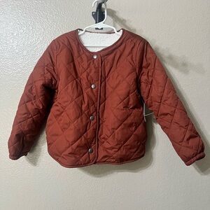 Old Navy girls reversible Quilted/sherpa Button-Up Jacket in burnt orange color.